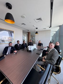 pexels photo 31739406 31739406 Business professionals in a formal meeting at a modern conference room.
